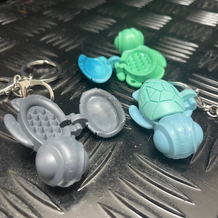 Calm Buddi Turtle Harm Minimisation Tool on a Custom Kaiko Keyring