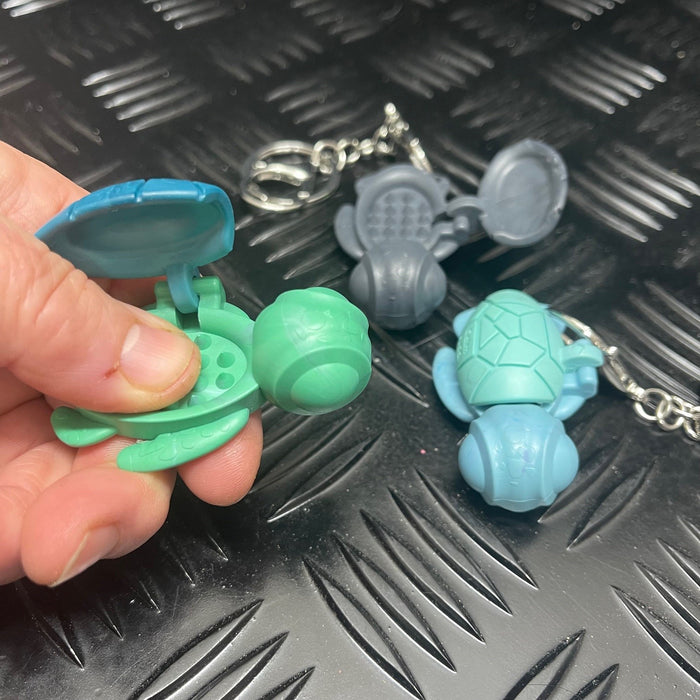 Calm Buddi Turtle Harm Minimisation Tool on a Custom Kaiko Keyring