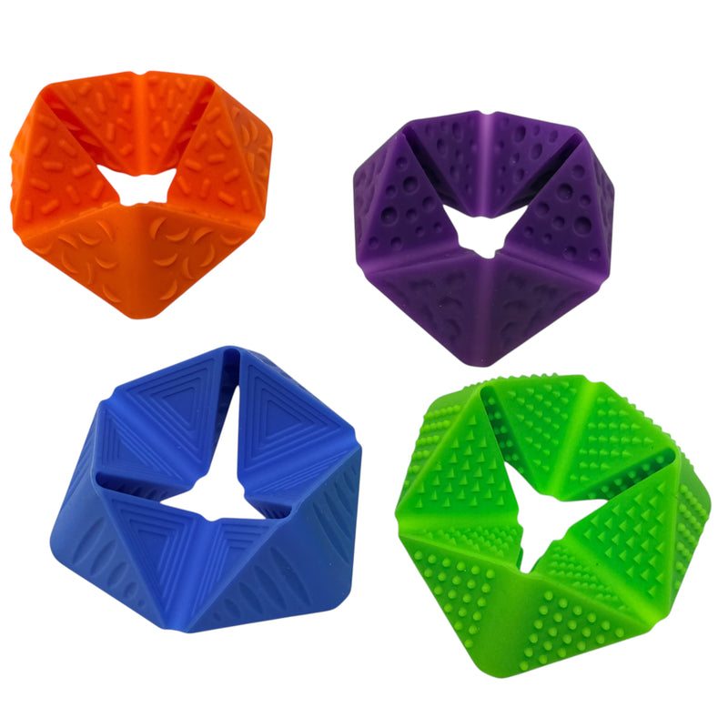 Four colourful Kaiko FLIPPI silicone sensory tools showing different textured panels