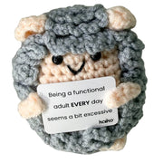 Front-facing Being a Functional Adult Every Day sheep crochet critter with message