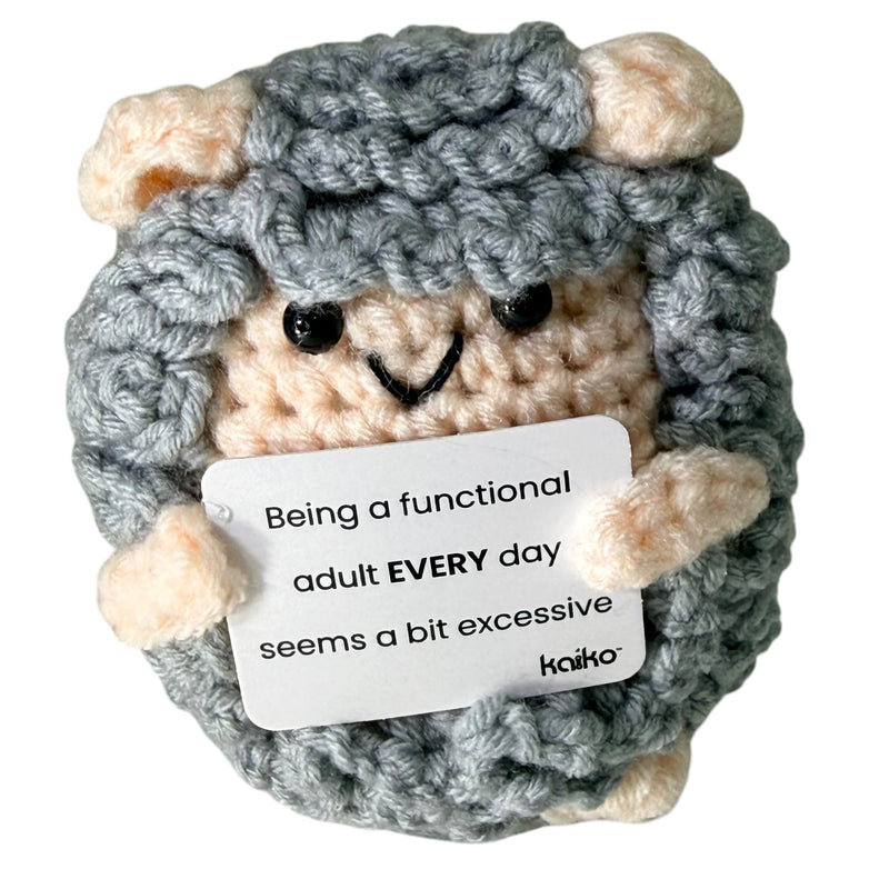 Front-facing Being a Functional Adult Every Day sheep crochet critter with message