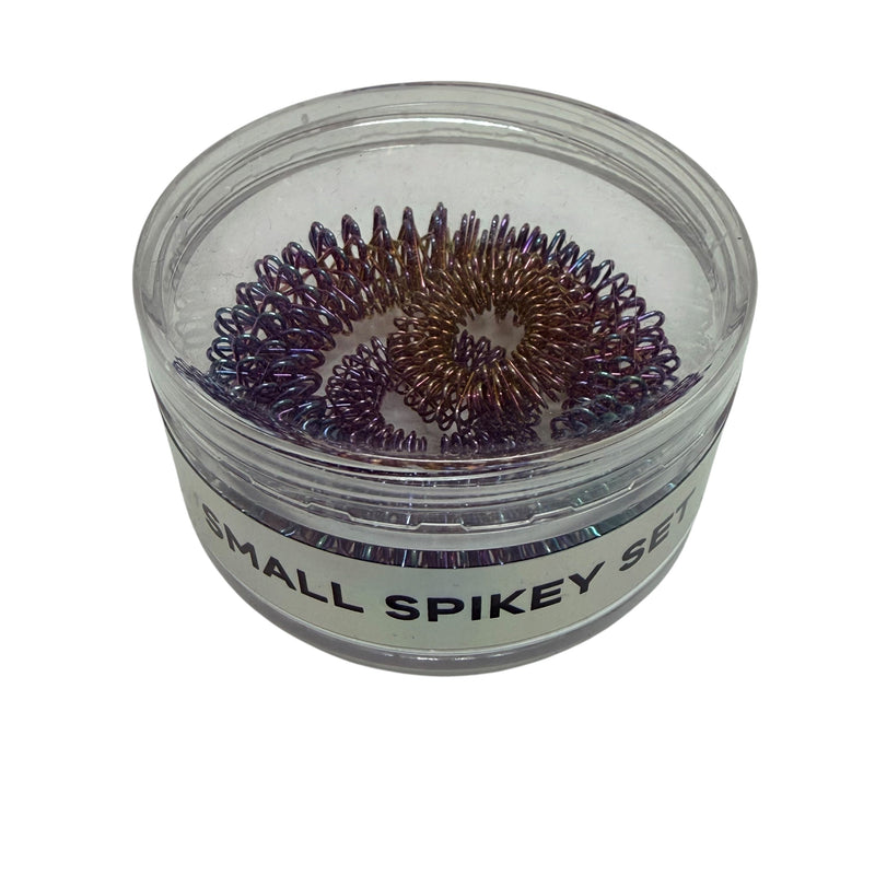Oil Slick Wrist and Finger Spikey Set - Small set in clear round packaging