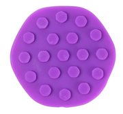 Close-up of the raised tactile texture on a purple Kaiko POPPI sensory tool