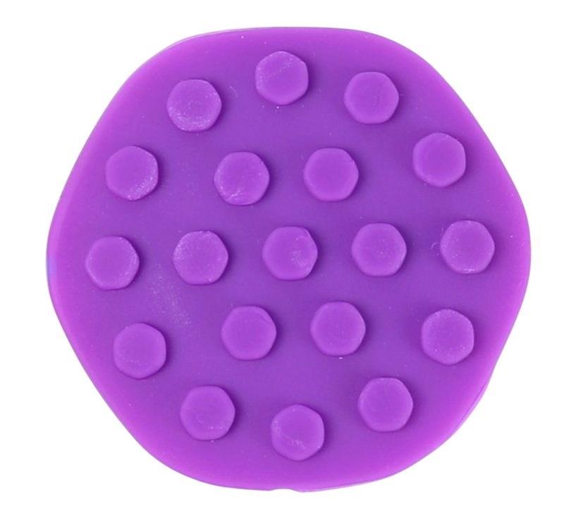 Close-up of the raised tactile texture on a purple Kaiko POPPI sensory tool