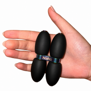 Kaiko Quad Roller resting in an open palm to show size