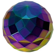 Spectra Optical Spinning Gyroscope with purple teal and gold reflections