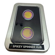 Two Spikey Spinner Hub accessories packaged in a metal window tin