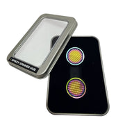 Pair of oil slick Spikey Spinner Hubs displayed in the included window tin