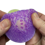 Purple Vivid Stretchy Pick 'Em being picked and pressed