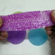 Pink Vivid Stretchy Pick 'Em stretched between two hands