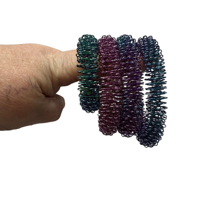 OIL SLICK Wrist Spikey - Harm Minimisation & Regulation Tool